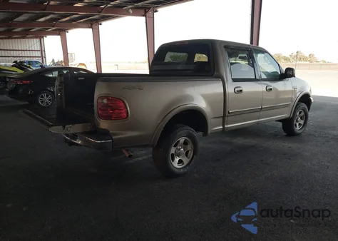 2003 Ford F-150 Lariat/Xlt z USA, uszkodzony, nr VIN 1FTRW08LX3KA14209